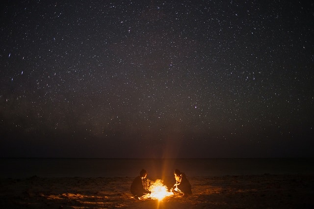 Image Source: Photo by Rachel Claire: https://www.pexels.com/photo/unrecognizable-couple-near-bonfire-on-coast-at-night-sky-5531009/
