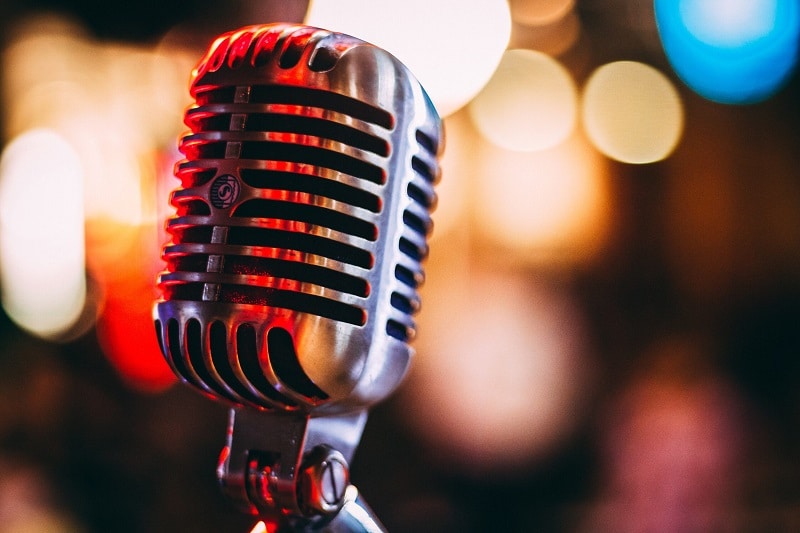 Karaoke microphone. Image from https://caribbeanbackingtracks.com/genres/