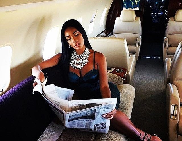 Woman in private jet. Image from https://www.pinterest.com/pin/703756178077564/