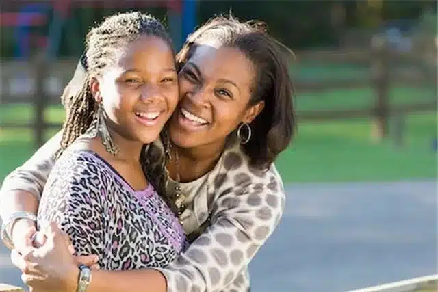 Black mother and daughter - black girls on how their mothers succeeded as parents